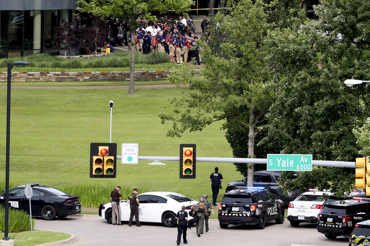 Tulsa police and firefighters respond to a shooting at the Natalie Medical Building Wednesday, ...