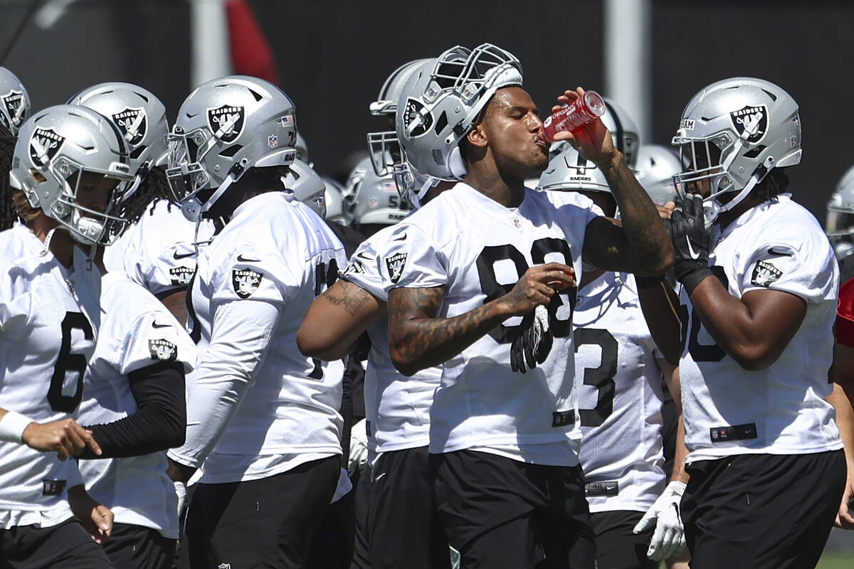 Raiders tight end Darren Waller (83) hydrates during practice at Raiders Headquarters and Inter ...