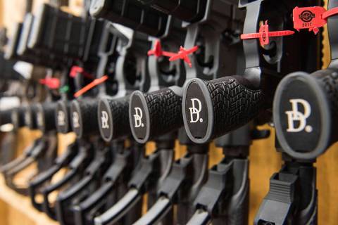 A row of AR-15 style rifles manufactured by Daniel Defense sit in a vault at the company's head ...