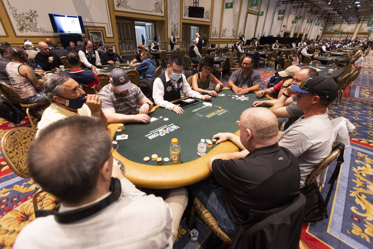 People participate during the World Series of Poker "Housewarming" event at Paris Las ...