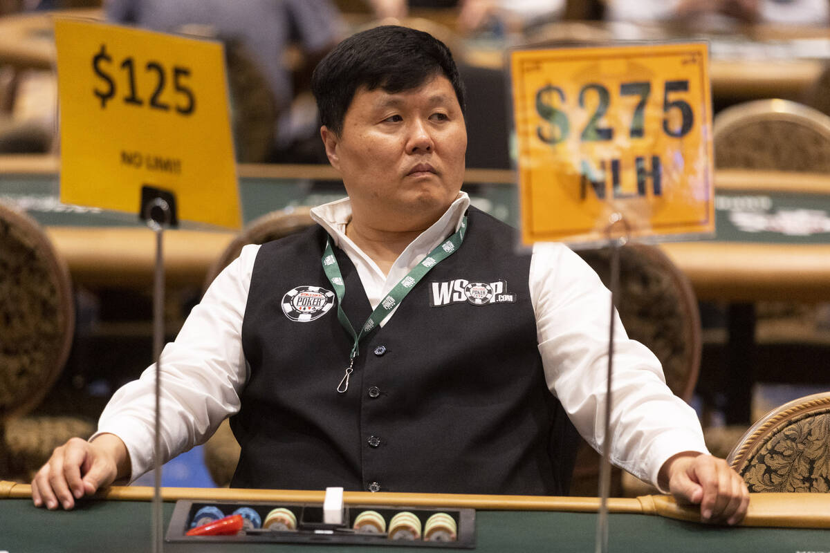 Dealer John Bong waits for players to sit at his table during the World Series of Poker "H ...