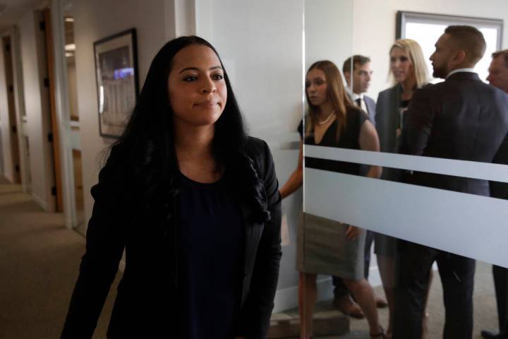Former Olympic gymnast Tasha Schwikert leaves a conference room after speaking to reporters Mon ...