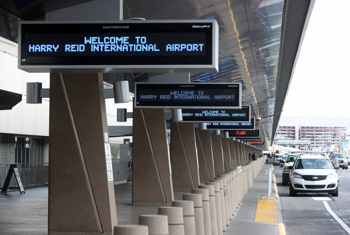 McCarran International Airport is officially renamed Harry Reid International Airport during a ...