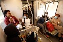Palisades Charter High School students ride the MTA Expo line after school let out in Los Angel ...
