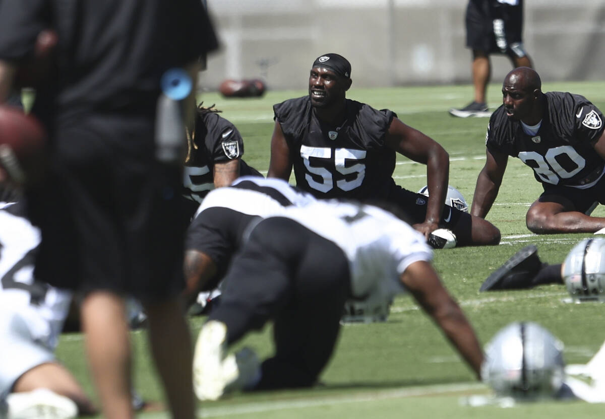 Raiders defensive end Chandler Jones stretches during practice at Raiders Headquarters and Inte ...