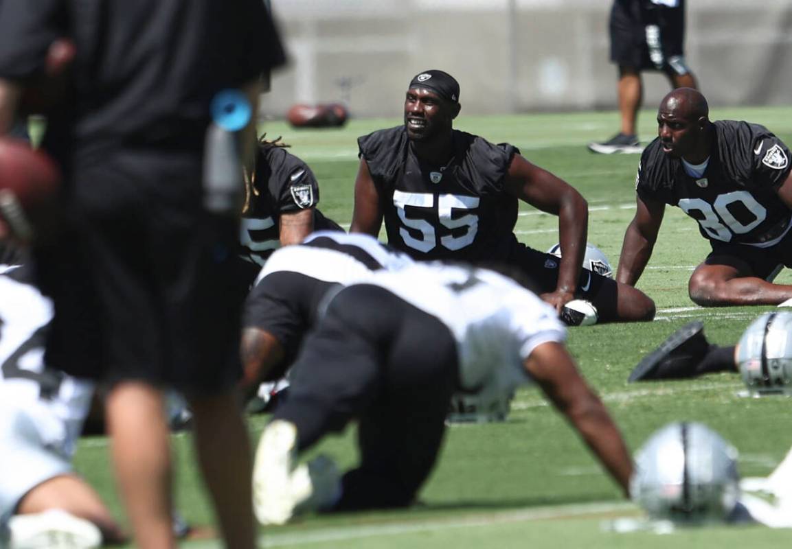 Raiders defensive end Chandler Jones stretches during practice at Raiders Headquarters and Inte ...