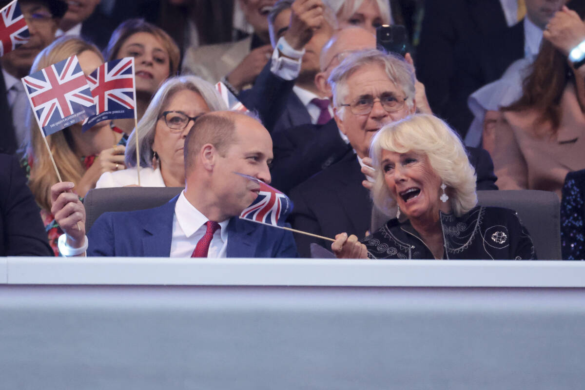Prince William and Camilla, Duchess of Cornwall watch the Platinum Jubilee concert taking place ...