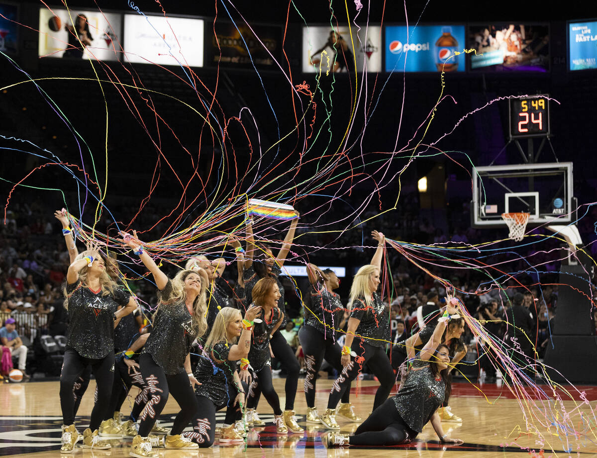 The High Rollers dance team perform in the first half during a WNBA basketball game between the ...