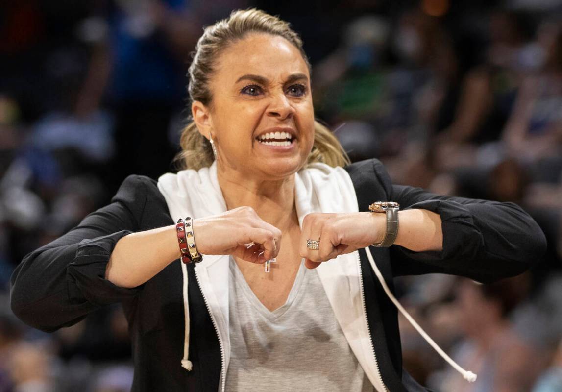 Aces head coach Becky Hammon argues a call in the second half during a WNBA basketball game aga ...