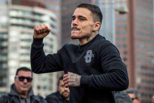 Australian boxer George Kambosos gestures during a public training session at Federation Square ...
