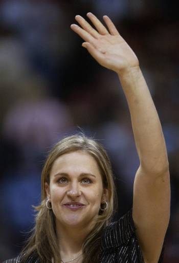 Linda Frohlick waves to the crowd during halftime of the UNLV mens basketball game Tuesday, Dec ...