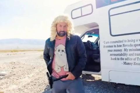 Nevada treasurer candidate and businessman Manny Kess wears a blond wig in an attack ad against ...