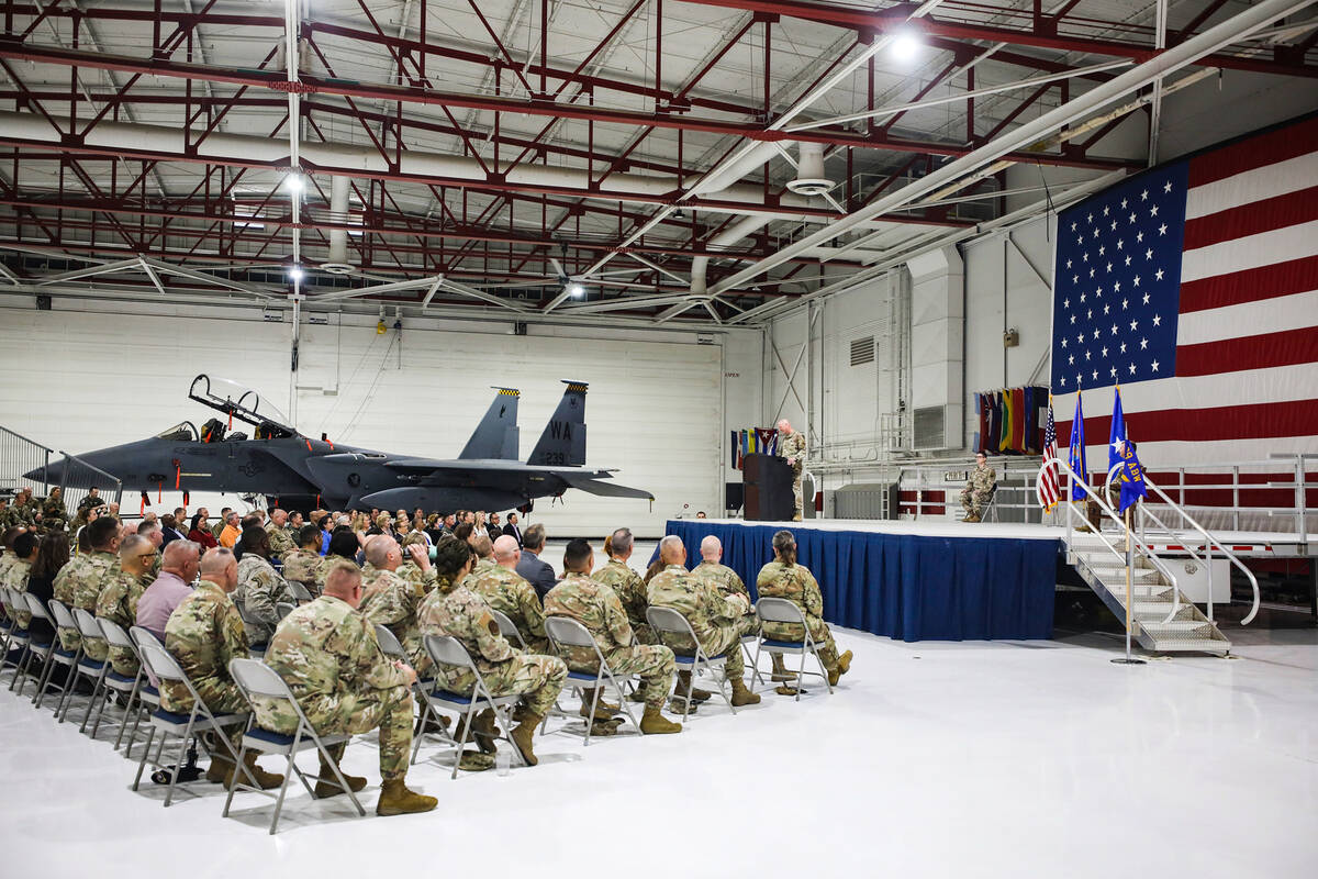 Col. Joshua DeMotts addresses the audience at an assumption of command ceremony at Nellis Air ...