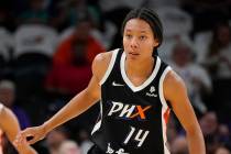Phoenix Mercury's Sam Thomas (14) plays defense during a WNBA basketball game against the Las V ...