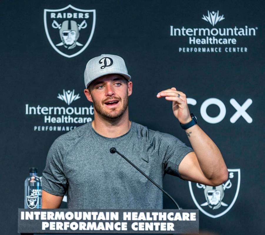 Raiders quarterback Derek Carr talks during minicamp practice at the Raiders headquarters withi ...