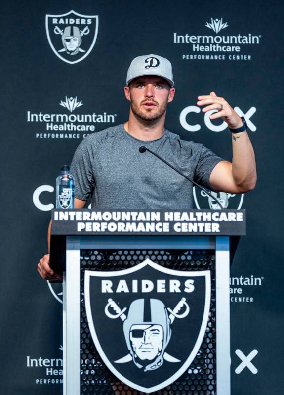 Raiders quarterback Derek Carr talks during minicamp practice at the Raiders headquarters withi ...
