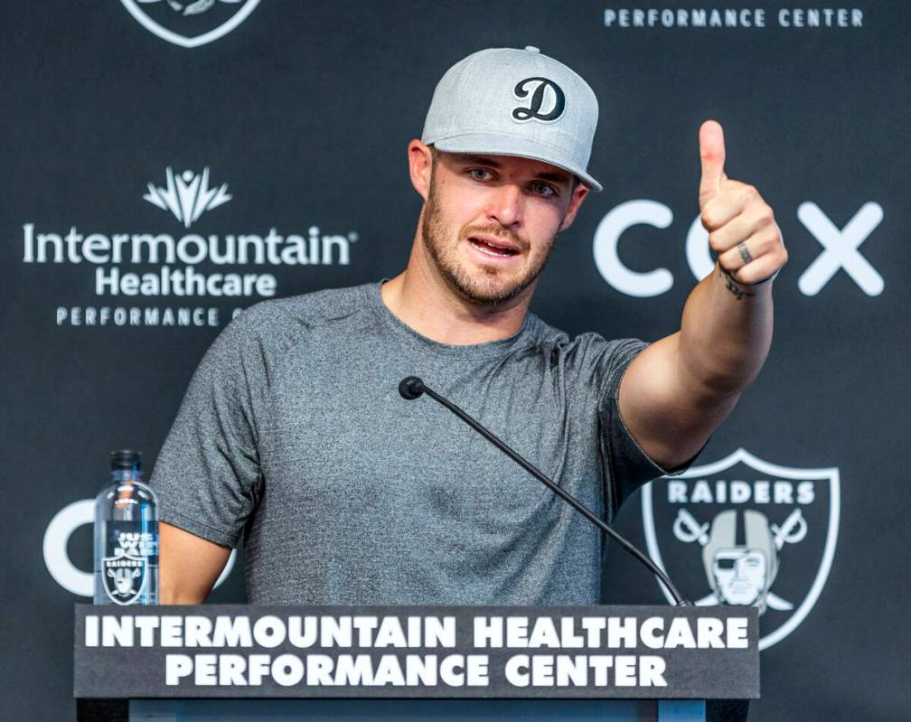 Raiders quarterback Derek Carr talks during minicamp practice at the Raiders headquarters withi ...