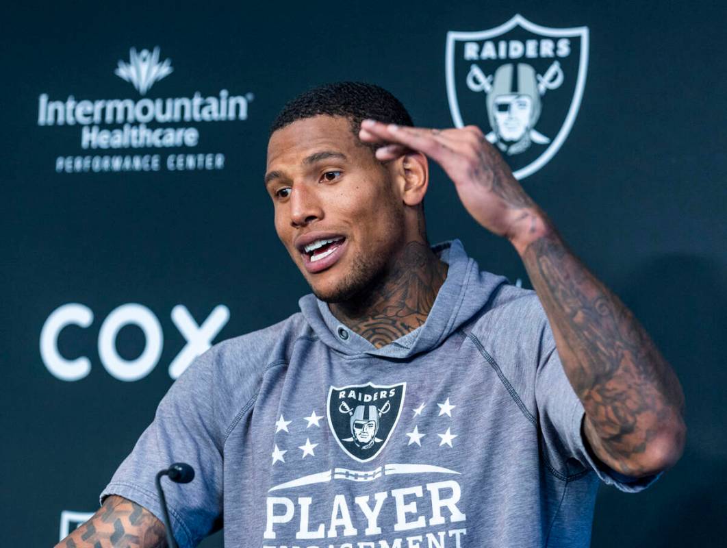 Raiders tight end Darren Waller talks during minicamp practice at the Raiders headquarters with ...