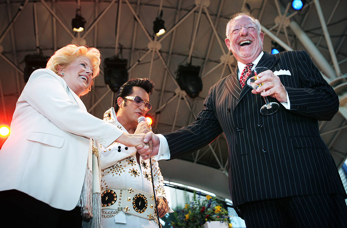 Jesse Garon as Elvis presides over a wedding vow renewal ceremony between Carolyn Goodman and t ...
