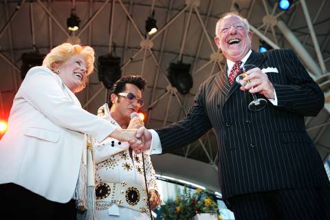 Jesse Garon as Elvis presides over a wedding vow renewal ceremony between Carolyn Goodman and t ...