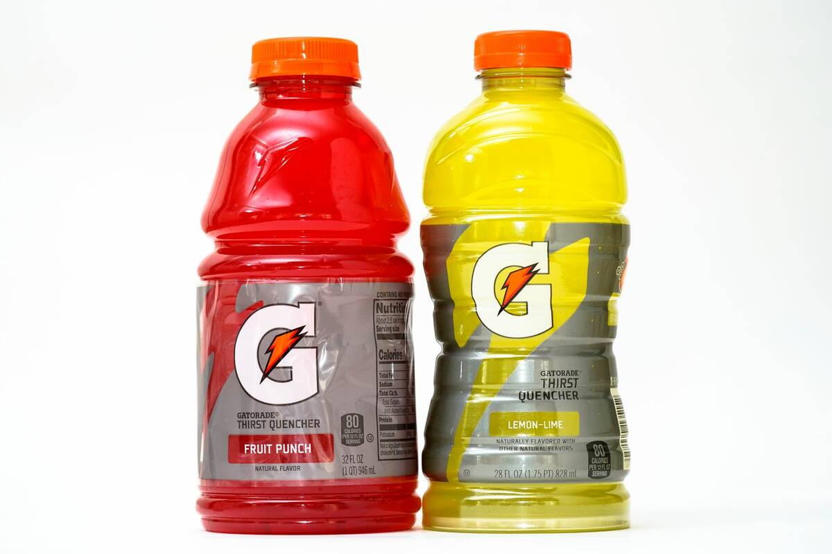 Bottles of Gatorade are pictured, left, a 32 fluid ounce and 28 fluid ounce, in Glenside, Pa., ...
