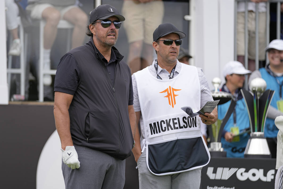 Phil Mickelson of the United States stands on the tee before starting the first round of the in ...