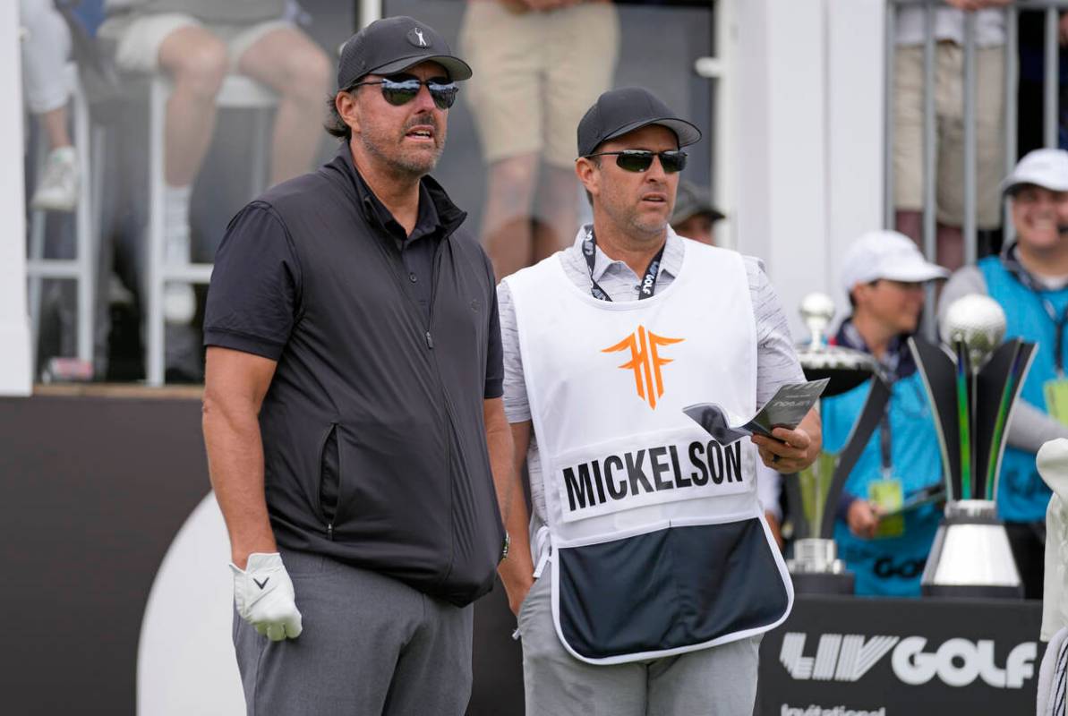 Phil Mickelson of the United States stands on the tee before starting the first round of the in ...