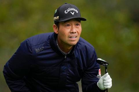 Kevin Na watches his tee shot on the fourth hole during the third round at the Masters golf tou ...