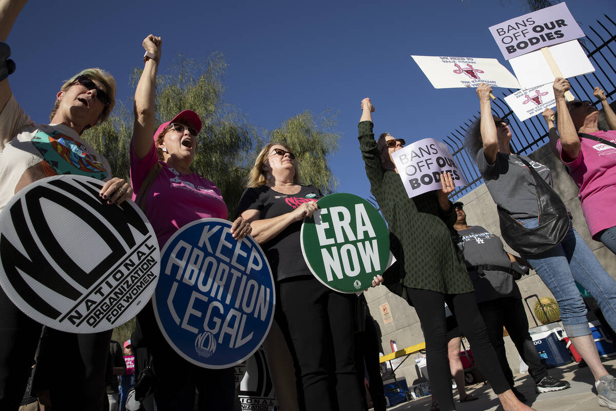 In this May 3, 2022, file photo, attendees of a rally in support of abortion rights chant “my ...
