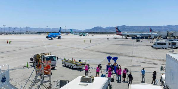 The Breeze Airways inaugural flight arrival taxis to the gate at Harry Reid International Airpo ...