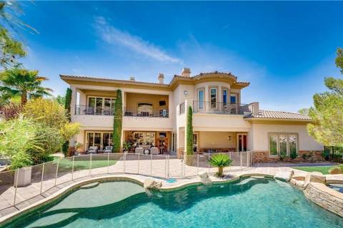 This Seven Hillis mansion has listed for $3.4 million. The Henderson custom-built home measures ...