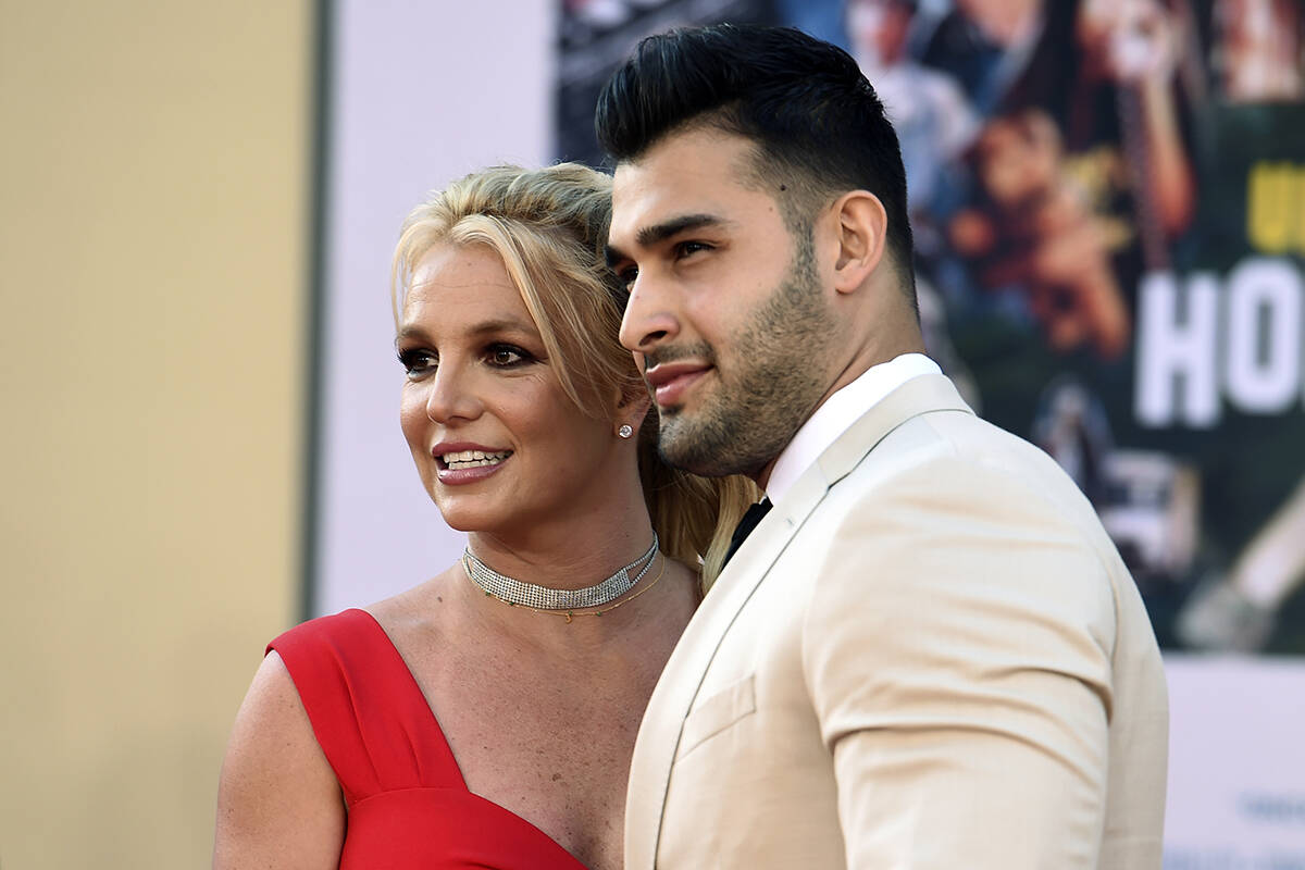 FILE - Britney Spears and Sam Asghari arrive at the Los Angeles premiere of "Once Upon a Time i ...