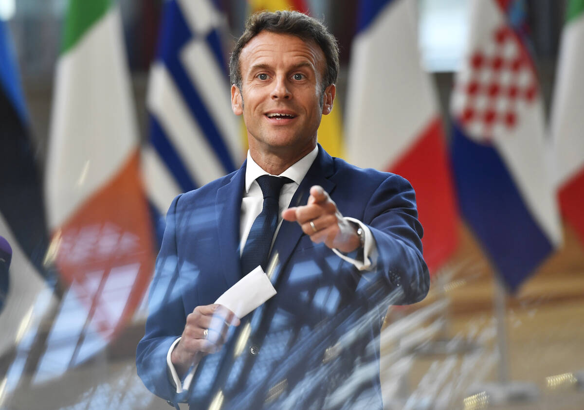 FILE - French President Emmanuel Macron speaks to media at the Europa building in Brussels, Tue ...