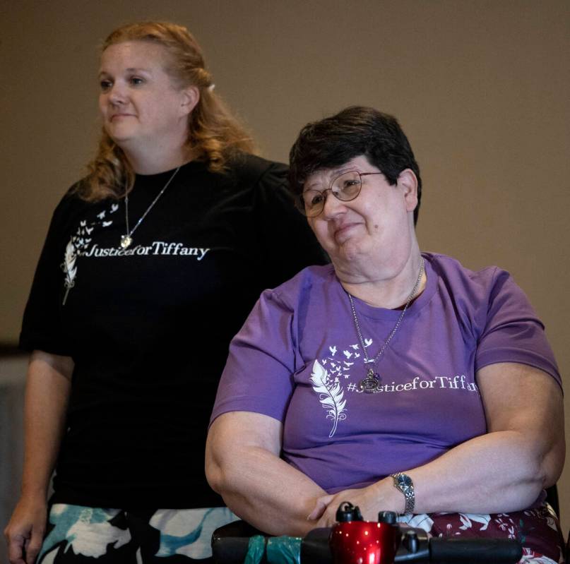 Malinda Beausoleil, left, aunt of Tiffany Booth, and Judy Booth, her mother, speak to mourners ...