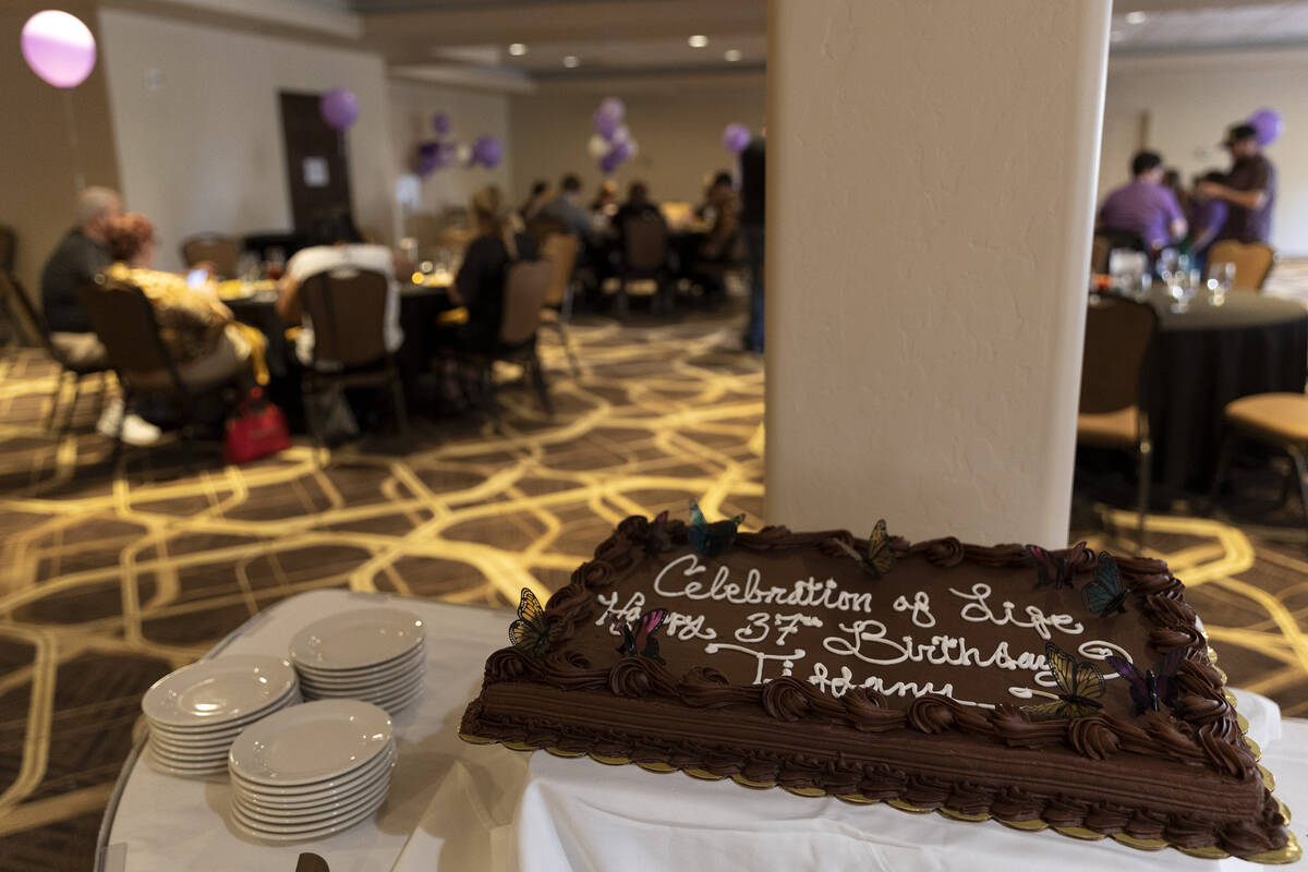A cake notes Tiffany Booth’s birthday during a memorial service for her at Tuscany Suite ...