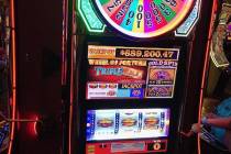 Wendy P, visiting from Kauai, Hawaii, bet $1.25 Friday to hit a “Wheel of Fortune” Triple G ...