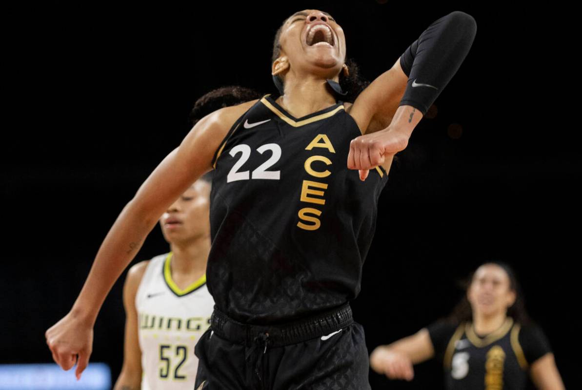 Aces forward A'ja Wilson (22) celebrates a big offensive play in the second half during a WNBA ...