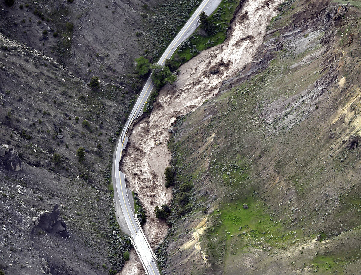 The highway between Gardiner and Mammoth in Montana is washed out trapping tourists in Gardiner ...