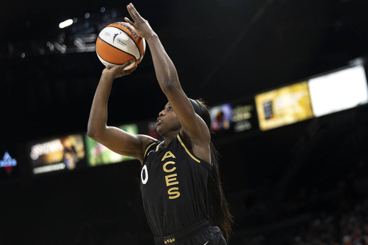 Las Vegas Aces guard Jackie Young (0) shoots against the Connecticut Sun during the second half ...