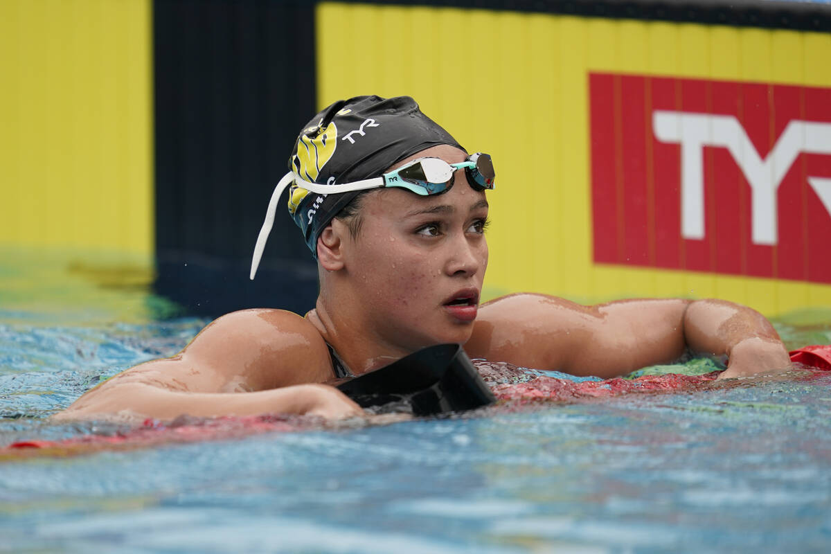 Bella Sims reacts after competing in the women's 400-meter IM prelim at the TYR Pro Swim Series ...