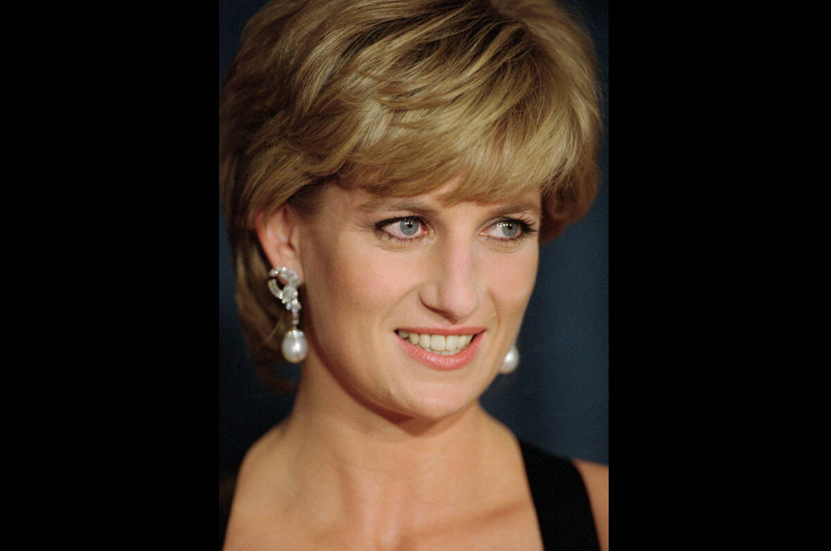 FILE - In this Dec. 11, 1995 file photo, Diana, Princess of Wales, smiles at the United Cerebra ...