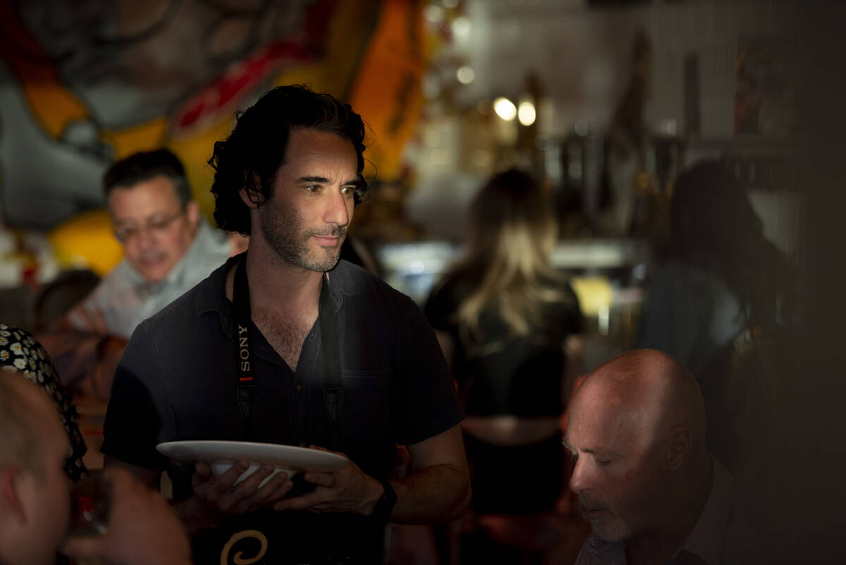 Tasting Collective founder Nat Gelb talks to diners at Valencian Gold during the inaugural Las ...