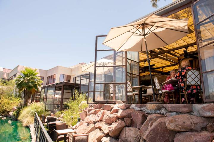 Ana Peña, left, and Carli Medina eat lunch on the lakeside patio at Marché Bacchus on ...