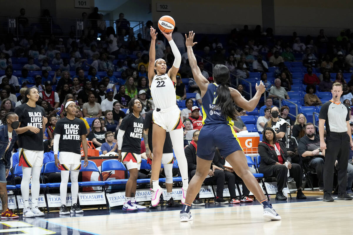 A'ja Wilson #22 of the Las Vegas Aces shoots a three point basket during the game against the D ...