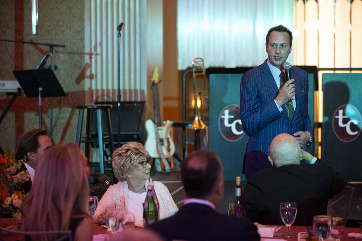 Artist Mario Basner speaks during the Las Vegas Philharmonic’s fundraising event at the ...