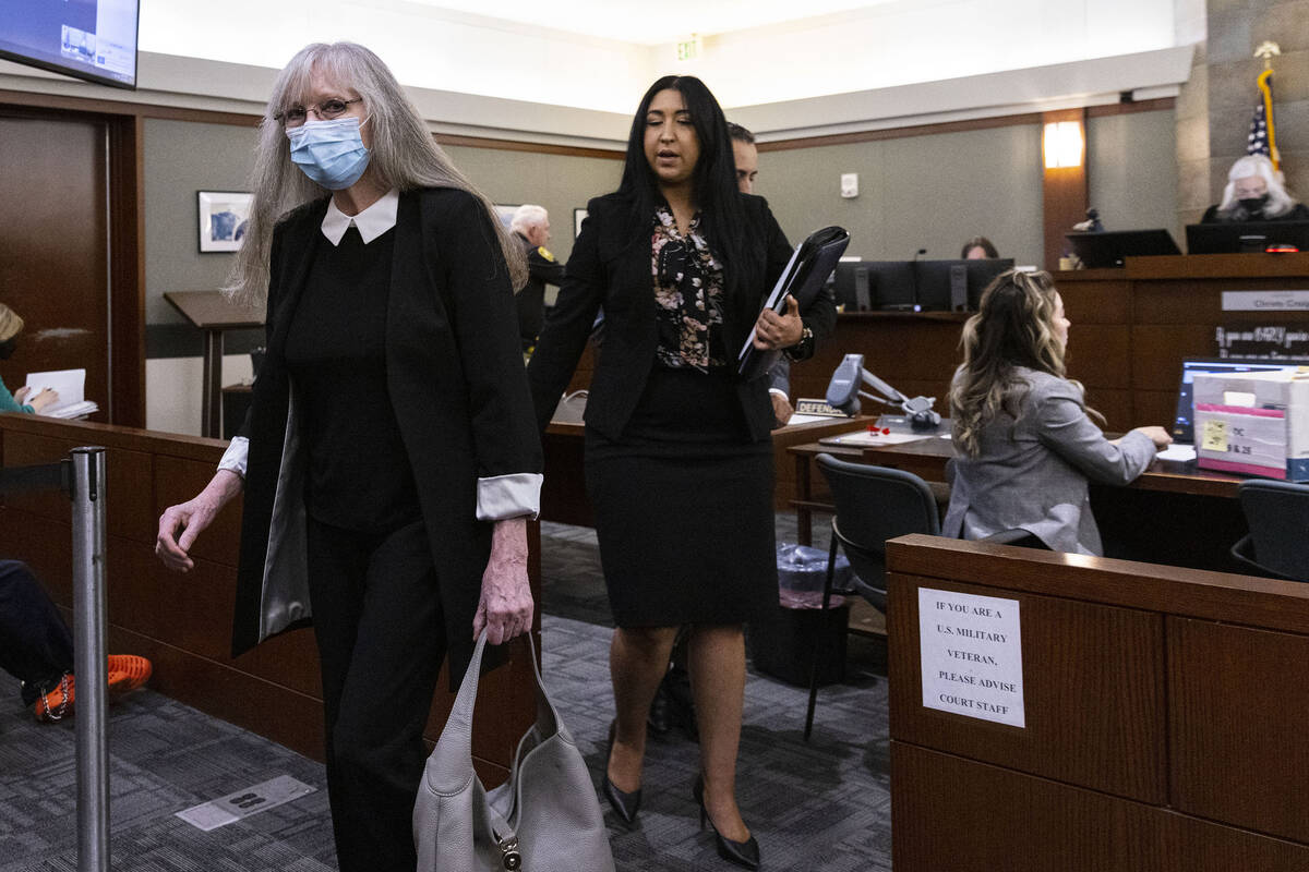 Linda Cooney, left, leaves the courtroom with her attorney Sophie Salcedo, after her sentencing ...