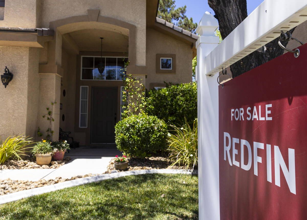 Redfin's for sale sign is posted outside a single family house at Novara Lane on Wednesday, Jun ...