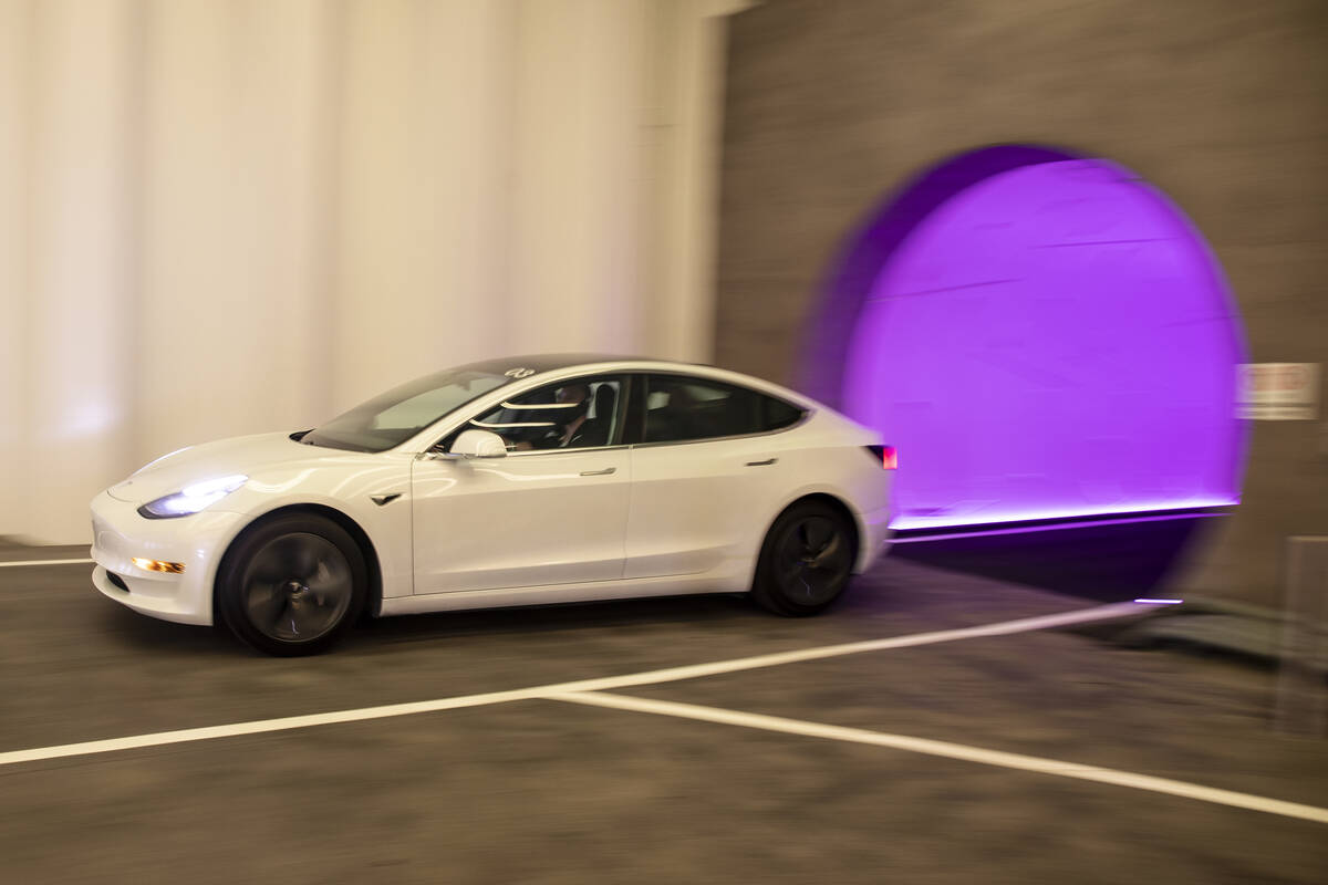 A Tesla electric car enters Central Station of the Boring Company’s Convention Center Loop at ...