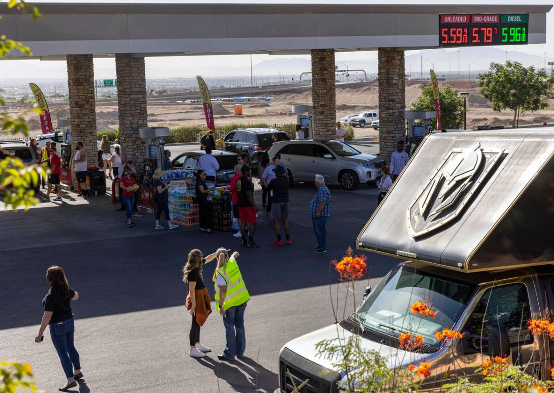 Cars line up to get free gas from Smith’s Marketplace on Thursday June 16, 2022, in Las ...