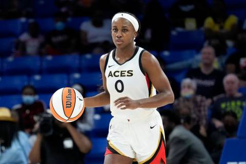 Jackie Young of the Las Vegas Aces dribbles the ball during the game against the Dallas Wings o ...